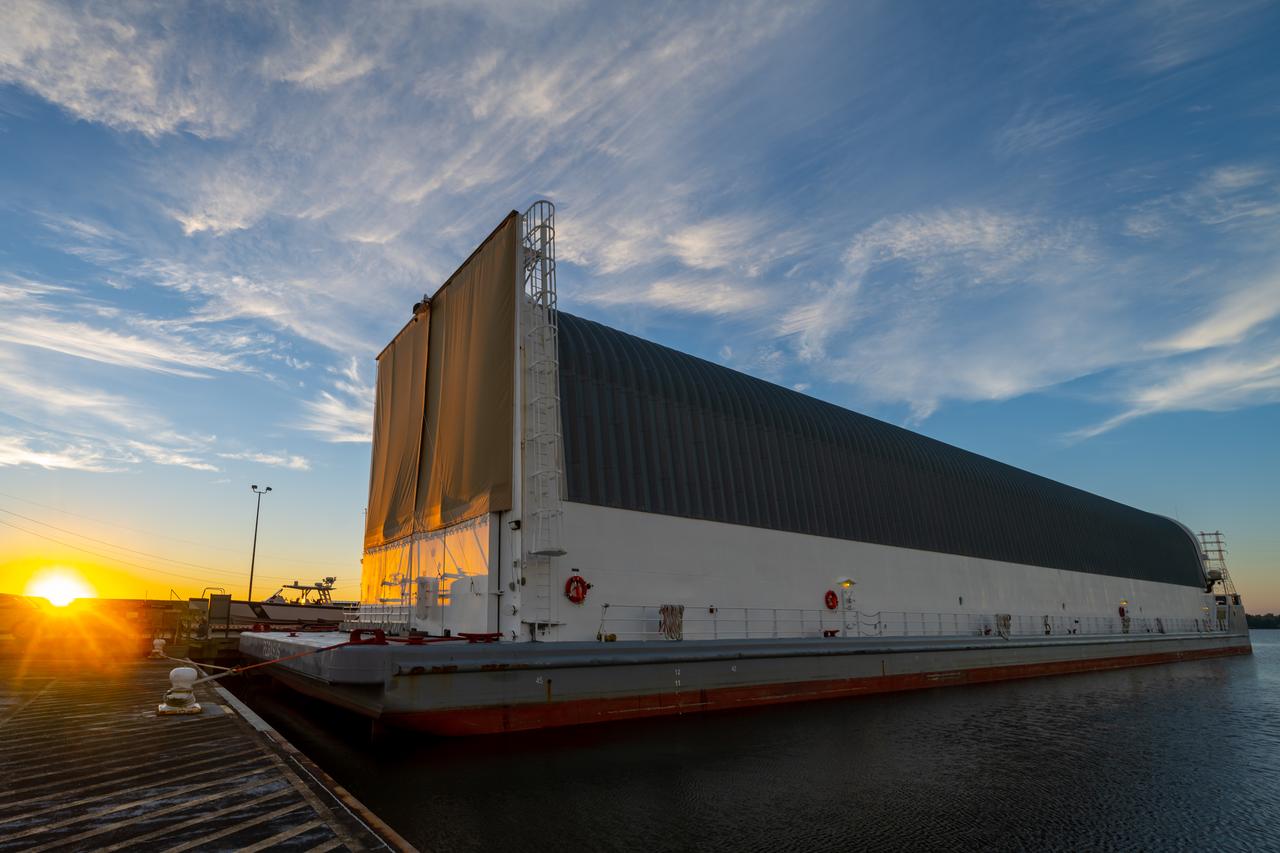 Teams at NASA’s Michoud Assembly Facility in New Orleans move the engine section flight hardware to the agency’s Pegasus barge Sunday, Dec. 4. The barge will ferry the engine section of NASA’s Space Launch System (SLS) rocket for Artemis III to the agency’s Kennedy Space Center in Florida. Once there, teams at Kennedy will finish outfitting the engine section, which comprises the tail-end of the rocket’s 212-foot-tall core stage, before integrating it to the rest of the stage. Beginning with production for Artemis III, NASA and core stage lead contractor Boeing will use Michoud, where the SLS core stages are currently manufactured, to produce and outfit the core stage’s five elements, and available space at Kennedy for final assembly and integration. Photo Credit: (NASA/Jared Lyons)